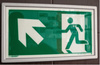 Ramka ze znakiem- Wyjście ewakuacyjne w górę w lewo