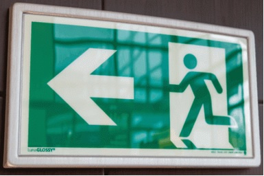 Ramka ze znakiem- Wyjście ewakuacyjne w lewo