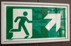 Ramka ze znakiem- Wyjście ewakuacyjne w górę w prawo