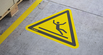 Uwaga, ślisko (znak podłogowy) (W011-F)